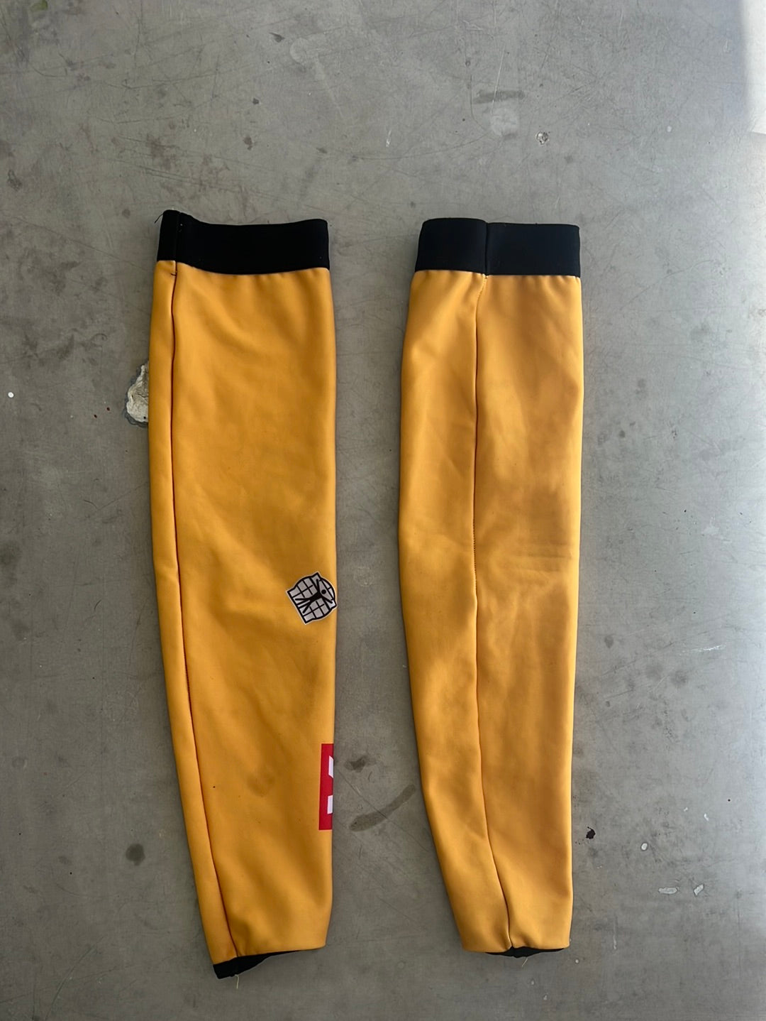 Uno-X | Bioracer Thermal Arm Warmers | Yellow | Pro-Issued Team Kit