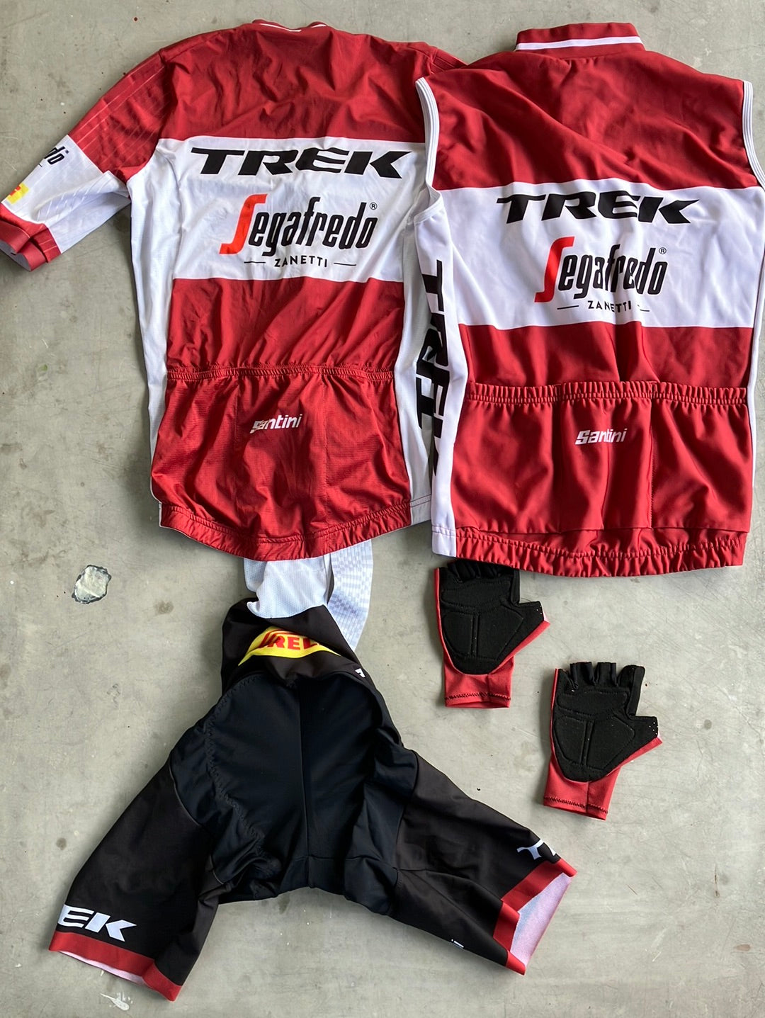 Trek Segafredo | Santini Bundle - Latvian National Champion Aero Jersey, Bibs, Thermal Gilet / Vest & Gloves | Burgundy | S | Pro-Issued Team Kit